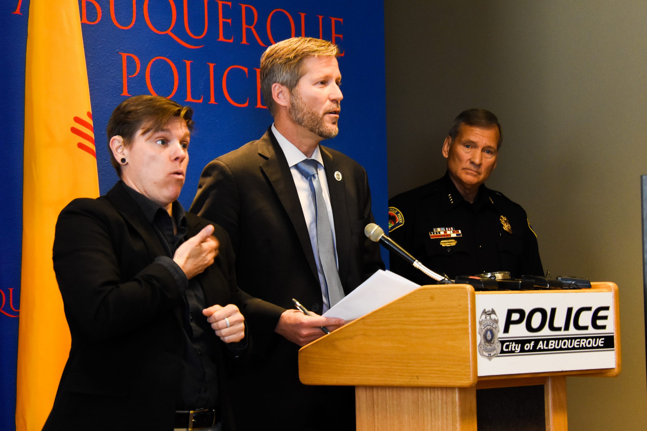 picture of abq mayor tim keller speaking at press conference