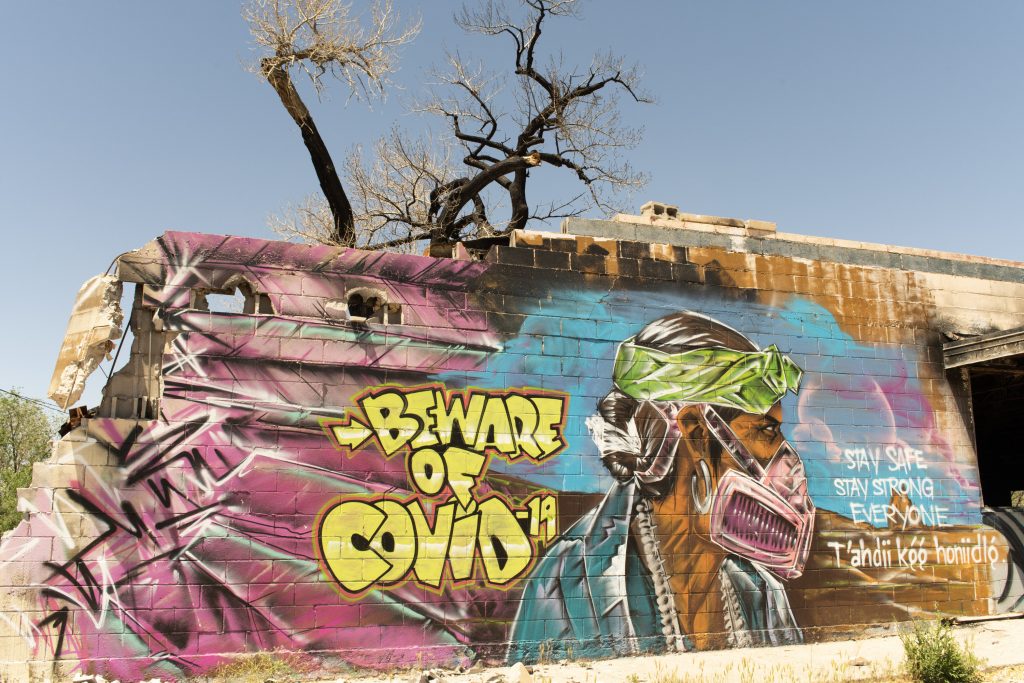 mural warns to beware of COVID disease