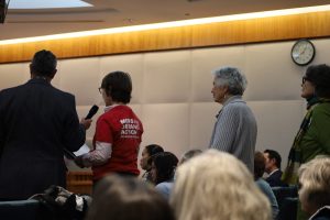 Speakers, including members of Moms Demand Action, line up in favor of House Bill 12 during a House Judiciary Committee meeting Wednesday. The bill amends an existing law allowing a judge to order the seizure of a person’s guns if they pose a risk to themselves or others. (Photo by Patrick Lohmann / Source NM)