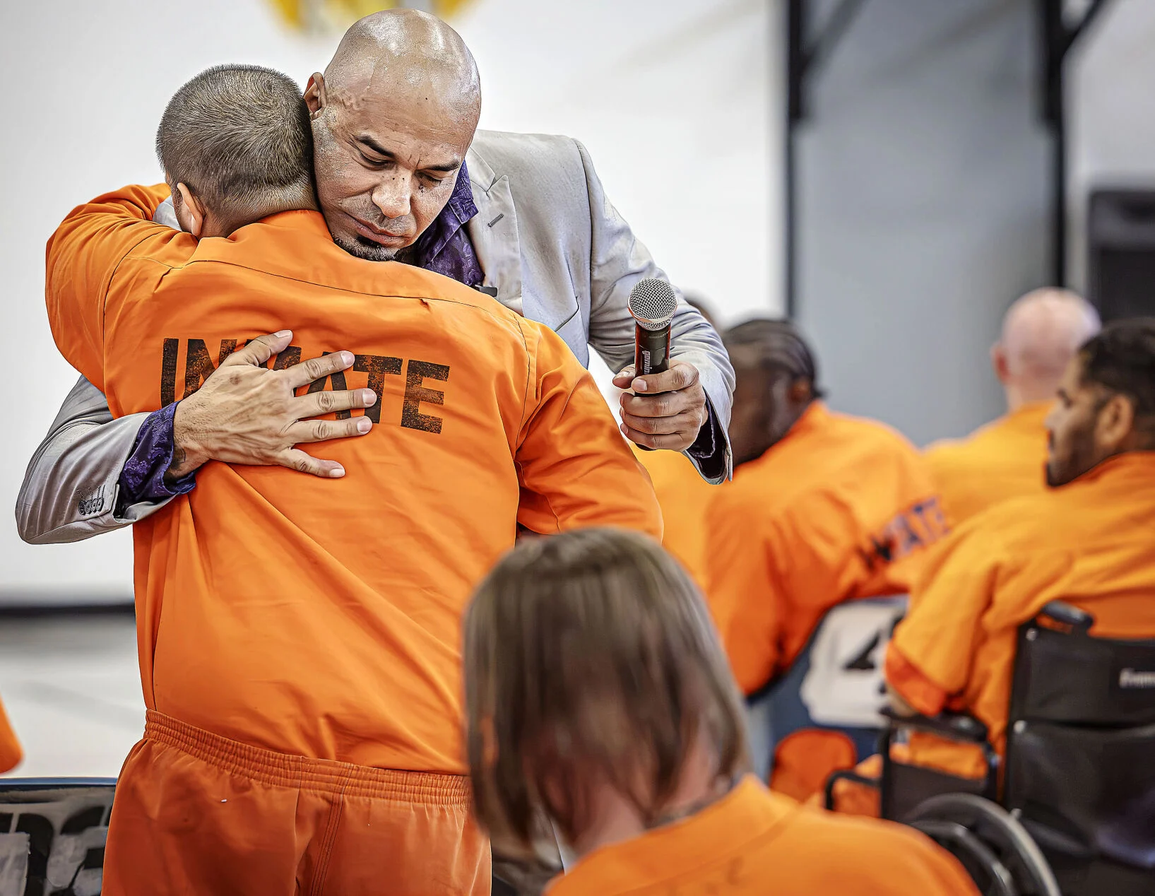 Actor Luis Moncada from the hit drama "Breaking Bad" goes into the audience to talk with prisoners one-on-one during a visit to the Penitentiary of New Mexico on Tuesday, Sept. 29, 2026, to meet with staff and talk with prisoners about his personal journey, mistakes and experience behind bars. Before becoming an actor, Moncada was a gang member and went to prison in the California state prison system.