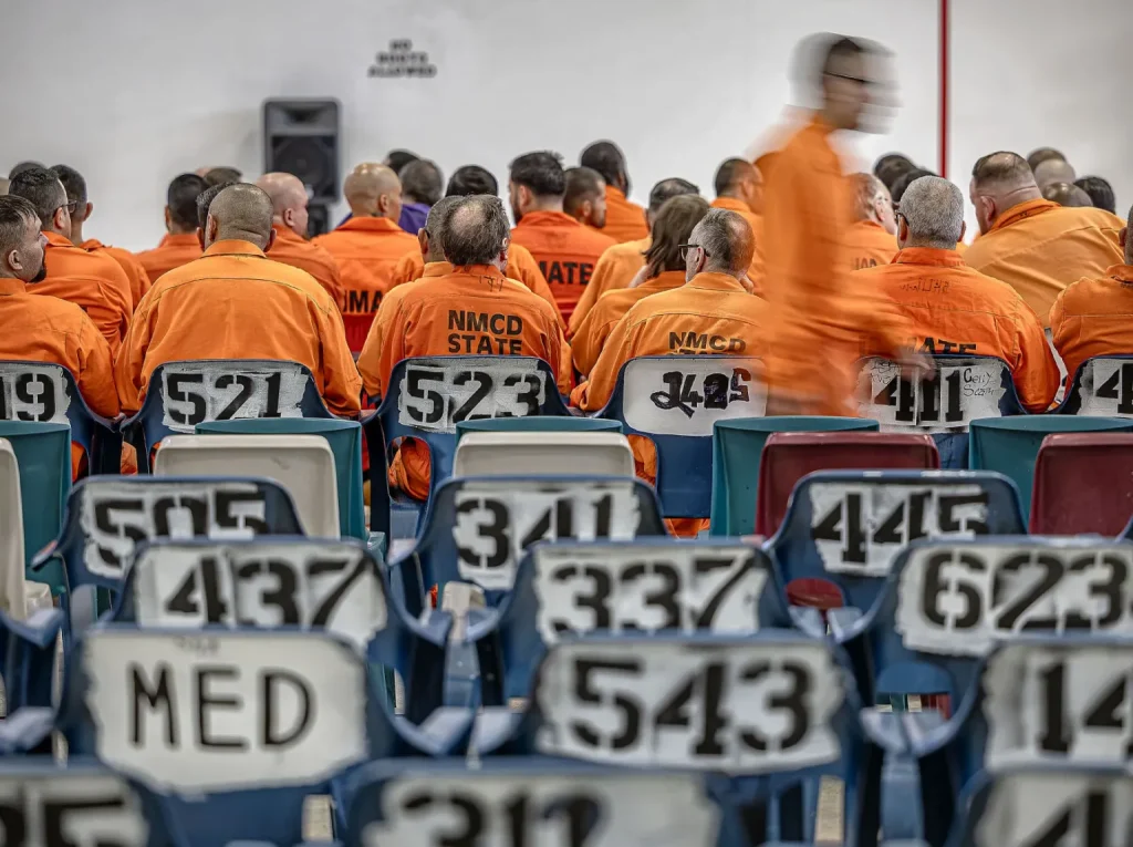 Prisoners take their seats before a visit by actor Luis Moncada from the hit drama “Breaking Bad” to the Penitentiary of New Mexico on Tuesday, Sept. 29, 2026, to meet with staff and talk with prisoners about his personal journey, mistakes and experience behind bars. Before becoming an actor, Moncada was a gang member and went to prison in the California state prison system.