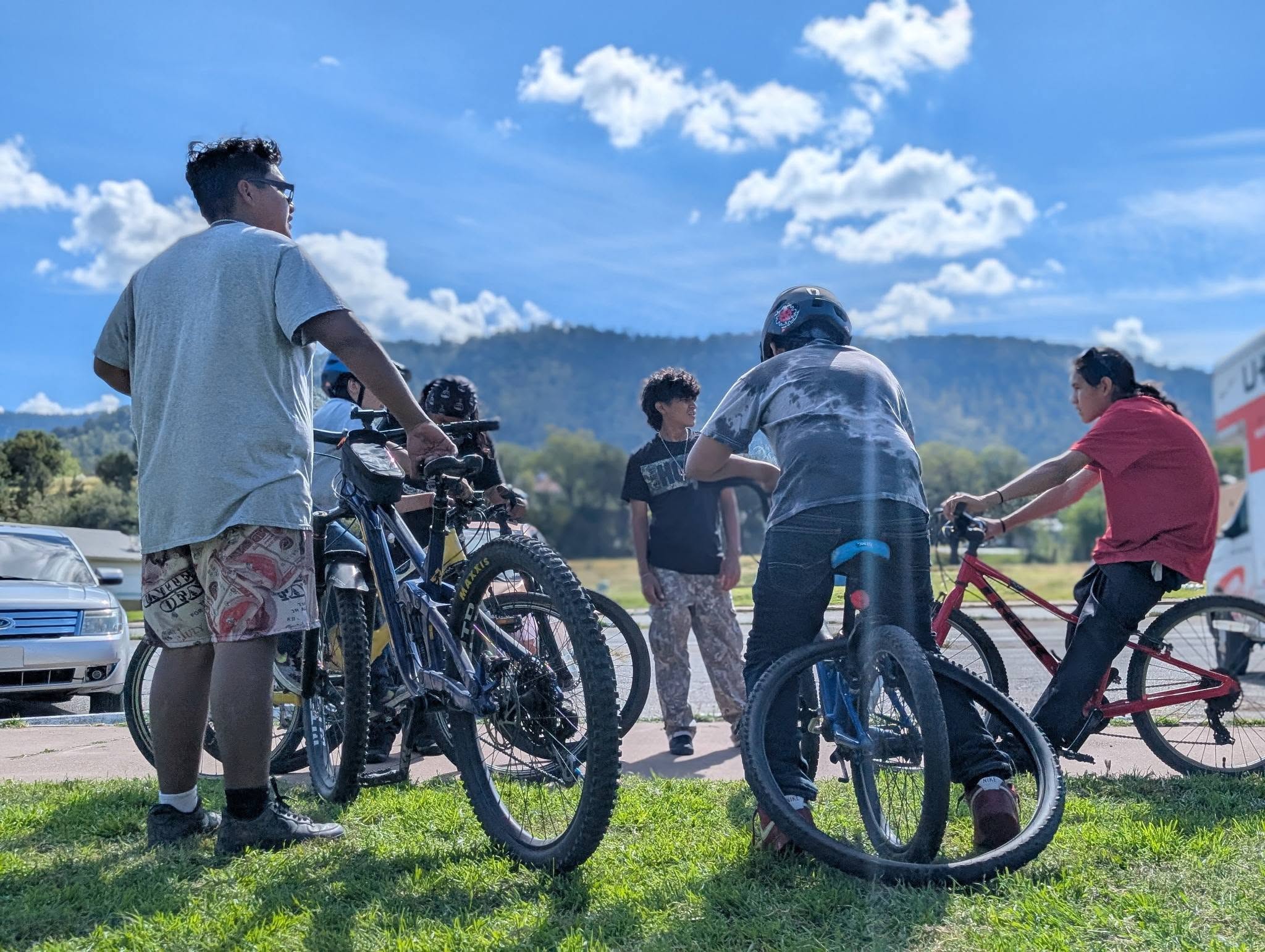 Mescalero Apache kids meet up for a bike ride in October 2026.